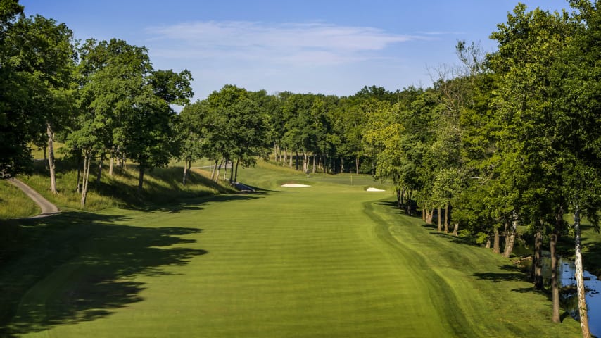 Homestretch: Brush Run Creek lines the right side of this slight dogleg-right, as well. But the real difficulty is the formidable green complex, which features two bunkers in front and a severe drop-off to a closely manicured chipping area to the right. The natural amphitheater is a prime spot for spectator viewing. (Source: PGA of America)