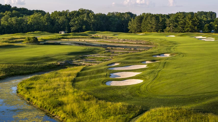 Genuine Risk: The split fairway sets up a classic risk vs. reward dilemma. Driving to the left shortens the hole by more than 50 yards, but the landing area is only 26 yards wide, surrounded by bluegrass rough, and guarded by water right; the approach from this island fairway is 210-230 yards, all over water. Driving to the right is longer but safer. With water along the front and left side of the green, it’s a brave player who attacks from any angle. (Source: PGA of America)