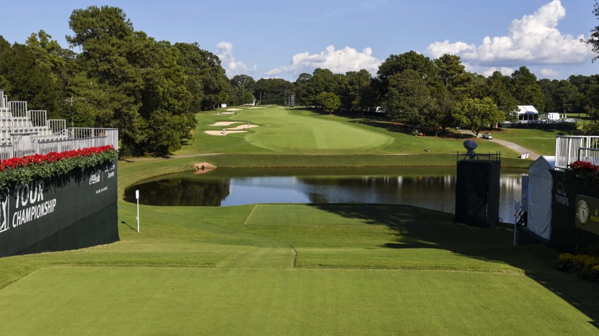 A par 5 that has been shortened to play as a par 4 for the TOUR Championship, this hole requires that the tee shot be long and to the left side of the fairway to allow players to see the putting surface. The second shot will be a mid-to long-iron into a fairly large green. The green slopes severely from back right to front left, making lag putting from the back a real chore.