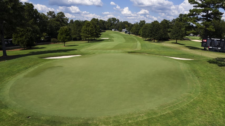 On this long, straight par 4, players will want to avoid the two fairway bunkers on the right to set up a mid-iron approach to this green. The green slopes from left to right, making left hole locations most difficult.