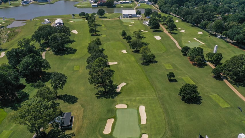 This is a good driving hole. From the championship tee box, players aim just to the right of the fairway bunkers. A left-center fairway position is ideal. Right center is workable, but it means dealing with the right greenside bunker on the approach. Like many others at East Lake, the green is sloped from back to front, making ball position on the green critical.