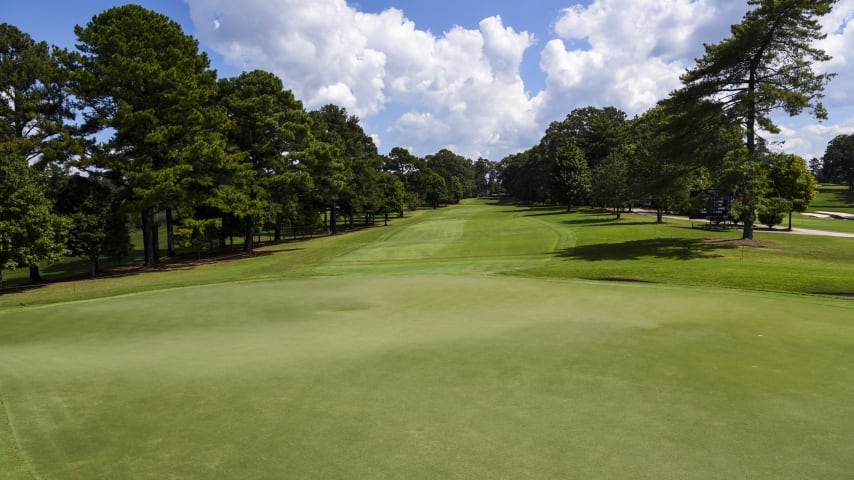 Old oaks and tall pines make this straight-away par 4 a very tight and demanding driving hole. Longer tee shots could leave a difficult sidehill stance along the right side of the fairway. The two-tiered green is bunkered on both sides, with the green sloping from back to front. Players placing their ball below the hole will have opportunities for birdie.