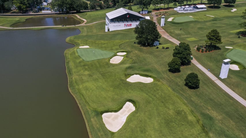 Two bunkers lie to the right of the fairway landing area on this par 4 at East Lake. The approach is played to a large, undulating green that is flanked by a big bunker to the right and one short to the left. A dominant ridge crosses the center of this green, making it tough to get the ball close to back hole locations.