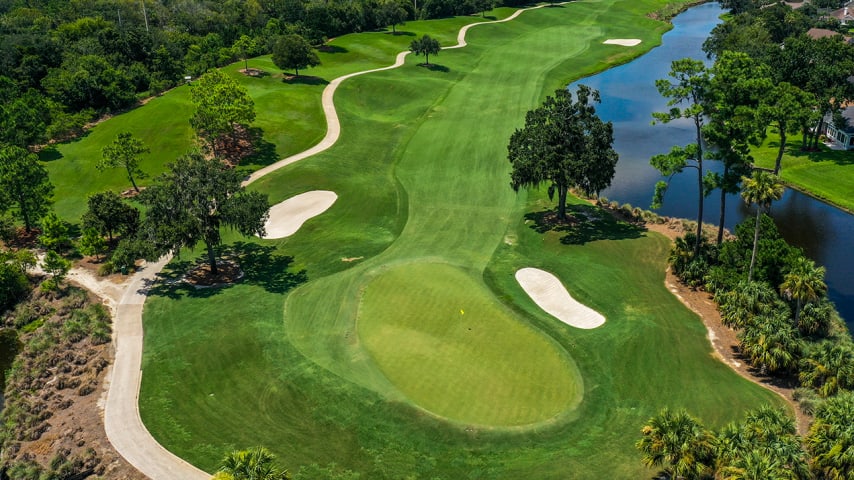 The 17th, a par 5 for the members but a par 4 this week, stretches to 499 yards. Water again protects the left side of the fairway of this slight dogleg left but is not in play around the green. One of the course's flatter putting surfaces awaits long approach shots on this hole, which was the third-toughest in 2014.