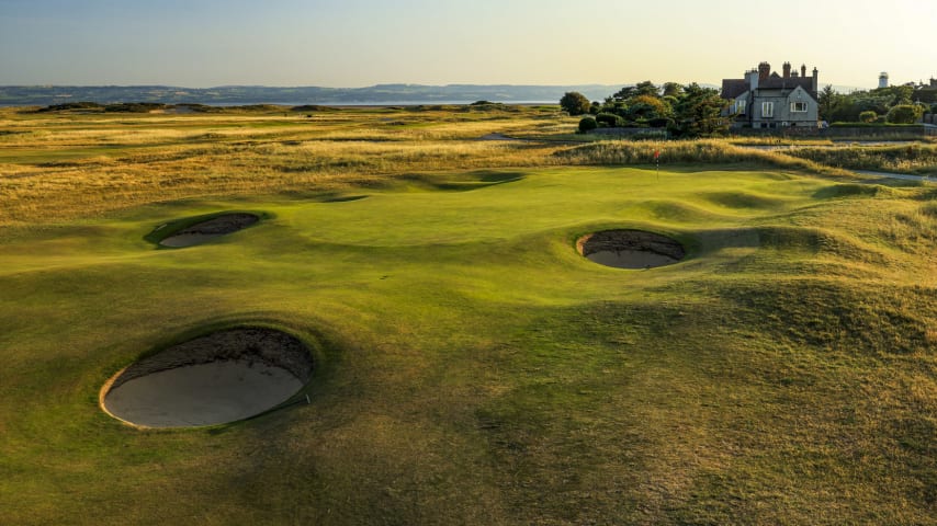  The 1st hole at Royal Liverpool is a tricky beginning for the top professionals, without taking into account the pressures of being the opening for an Open Championship. Bunkering on both sides of the fairway at ideal driving distance, including a new bunker in 2022, means strategic play is important. The prevailing wind at Royal Liverpool, from the west, would see this hole played more into the breeze. However, the wind often changes direction during the summer months, as has been the case at the previous two Hoylake Opens, which could enable players to try and be aggressive, driving over the bunkers to leave a shorter shot in. Regardless, finding the fairway gives the best chance of finding a narrow target with lots of run-off areas and surrounding bunkers. The green is also notoriously tricky in its subtleties, and with a number of humps and hollows, finding the right portion of the putting surface is key on approach shots, placing further emphasis on being in the fairway to begin your Championship. (Source: R&A)