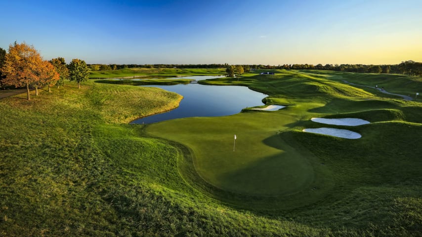 The difficulty of this green lies in the undulations that tempt balls into the water, protecting the green on its right. Aiming for the left side of this par 3's green, players will be left with an uncomfortable downhill putt. (Source: PGA of America)