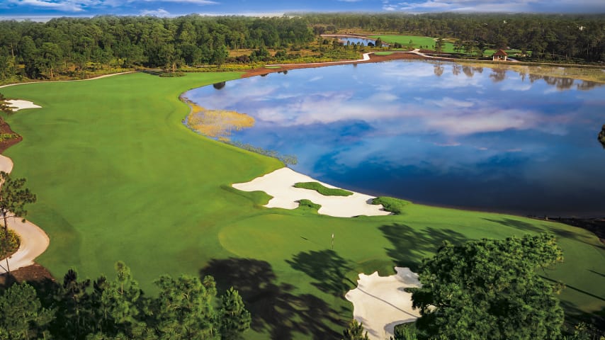 Your tee shot target is just left of the fairway bunker on this imposing par 4. If playing downwind, a fairway metal might be your best bet. A mid- to short-iron approach to a green guarded on the left by a bunker and water remains. Bail out short and right if you must.