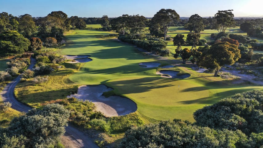 Hole 7: Par 5, 460 meters (2028 Presidents Cup Hole No. 1)  The par 5 seventh hole is a definite birdie or eagle chance. Drive down the left centre of the fairway, short of the cross bunker. I favour a fairway wood or long iron to pass the small swale at the entrance of the green. Any shot short of the swale is very difficult to judge.