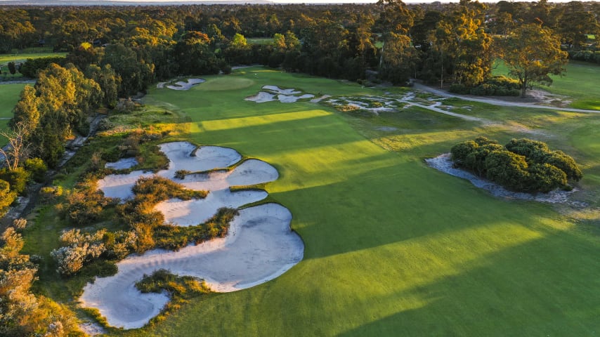 Hole 12: Par 5, 509 meters (2028 Presidents Cup Hole No. 4)  A solid par 5, and a real birdie chance with three well executed shots. However, the players, who take the shortest line along the left, must contend with fairway traps, thick timber, and an out of bounds.