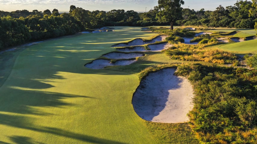 Hole 14: Par 5, 515 meters (2028 Presidents Cup Hole No. 6)  The longest hole, where birdies will be scarce. Bunkers 45 metres short of the green leave little opening for long hitters attempt to get close in two. An out of bounds left and behind the green provides an additional mental hazard.