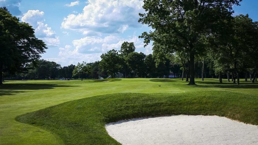 The dogleg par 4 13th requires a precise tee shot. Many players will opt for a fairway wood or long iron off the tee to set up a short iron into the elevated green. Spectators should see lots of birdies on this hole.
