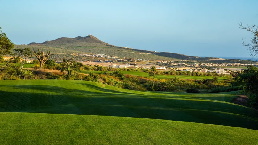 The tee shot on this hole must clear a substantial sandy arroyo. Opting for a more aggressive line to the right side of the fairway yields the best angle for approaching the right-to-left green. Shots to the left must contend with a bunker guarding the green's left side. The sandy arroyo extends along the entire right side, offering opportunities for daring recovery shots.