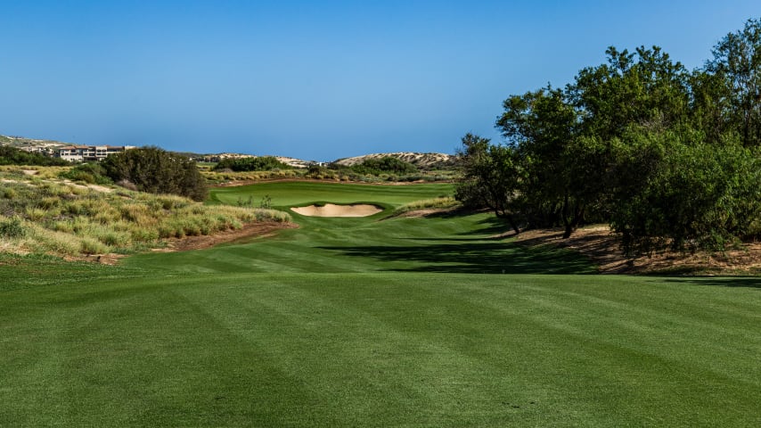 This downhill, downwind par 3 leads to a spacious green situated in a depression encircled by dunes. The contours around the punchbowl-style green can guide balls onto the putting surface. However, given the green's generous size, pin placement will determine the length of the birdie putt. A menacing bunker looks closer to the green than it is and protects any center-cut pins. 