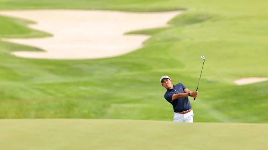 LOUISVILLE, KENTUCKY - MAY 13: Takumi Kanaya of Japan chips onto the ninth green during a practice round prior to the 2024 PGA Championship at Valhalla Golf Club on May 13, 2024 in Louisville, Kentucky. (Photo by Michael Reaves/Getty Images)