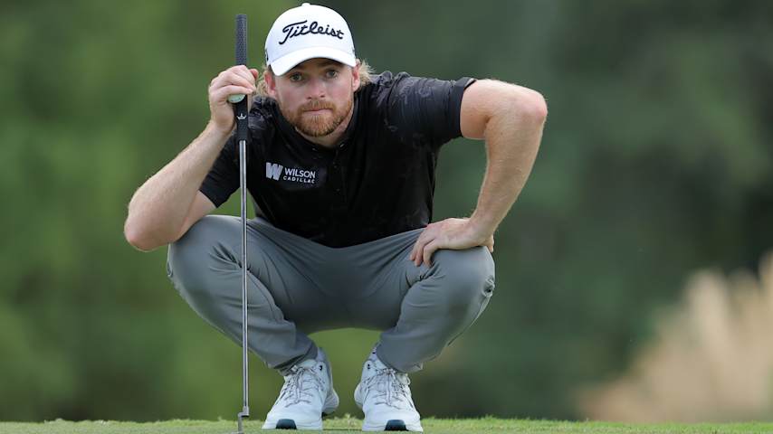 Danny Walker of the United States lines up a putt on the 16th green during the final round of the Sanderson Farms Championship 2025 at The Country Club of Jackson on October 05, 2025 in Jackson, Mississippi. (Jonathan Bachman/Getty Images)
