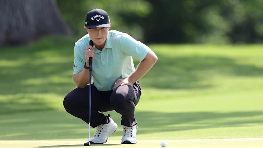 Blades Brown of the United States lines up a putt on the fifth green during the first round of the Charles Schwab Challenge 2025 at Colonial Country Club on May 22, 2025 in Fort Worth, Texas. (Sam Hodde/Getty Images)