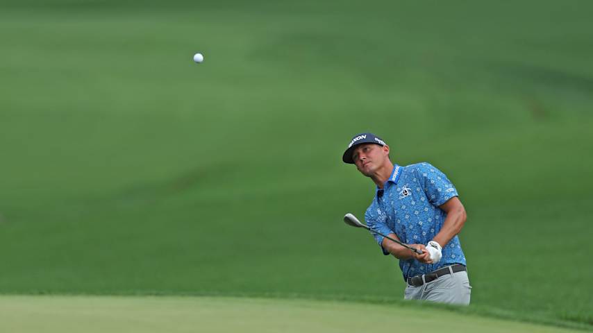 CHARLOTTE, NORTH CAROLINA - MAY 16: Max McGreevy of the United States hits a chip shot on the 18th hole during the second round of the PGA Championship at Quail Hollow Country Club on May 16, 2025 in Charlotte, North Carolina. (Photo by Krista Jasso/Getty Images)
