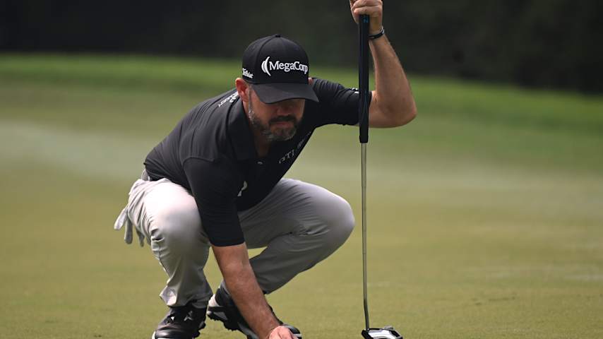 Brian Harman of the United States lines up a putt on the 3rd green on day four of the DP World India Championship 2025 at Delhi Golf Club on October 19, 2025 in New Delhi, India. (Prakash Singh/Getty Images)
