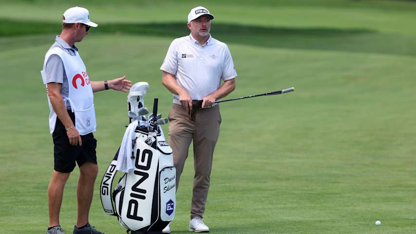 David Skinns of England prepares to play a shot on the eighth hole alongside his caddie during the third round of the Rocket Classic 2025 at Detroit Golf Club on June 28, 2025 in Detroit, Michigan. (Gregory Shamus/Getty Images)