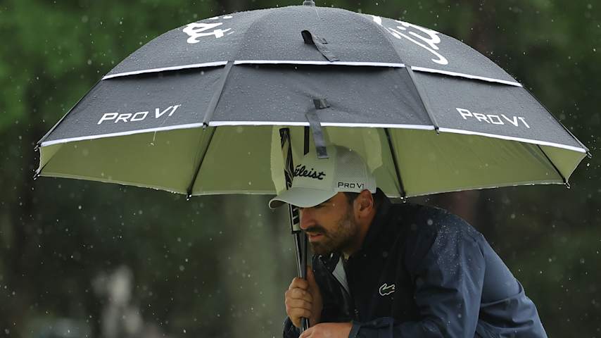 Antoine Rozner of France lines up a putt under his umbrella on the first green during the final round of the ONEflight Myrtle Beach Classic 2025 at Dunes Golf & Beach Club on May 11, 2025 in Myrtle Beach, South Carolina. (Jonathan Bachman/Getty Images)