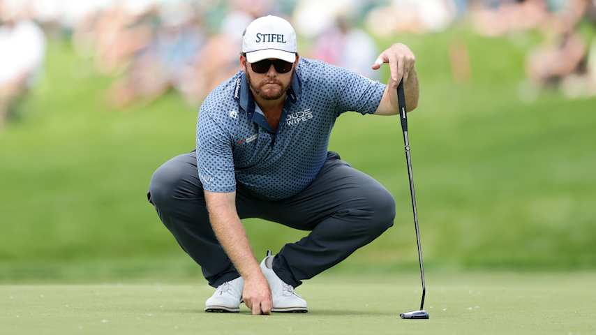 Harry Higgs of the United States lines up a putt on the 14th green during the first round of the Memorial Tournament presented by Workday 2025 at Muirfield Village Golf Club on May 29, 2025 in Dublin, Ohio. (Michael Reaves/Getty Images)