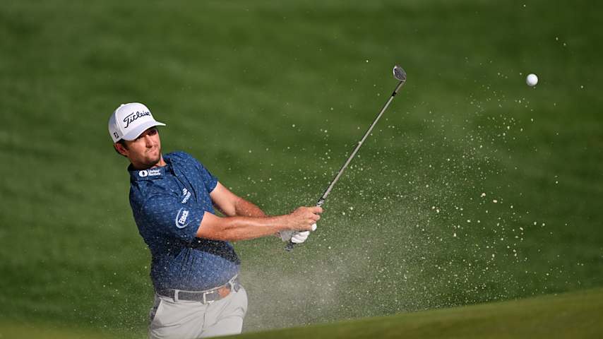 Davis Riley of the United States plays a shot from a bunker on the 18th hole during the third round of the PGA Championship at Quail Hollow Country Club on May 17, 2025 in Charlotte, North Carolina. (Ross Kinnaird/Getty Images)
