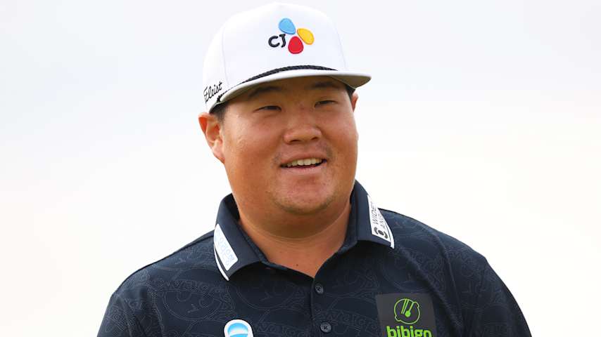 NORTH BERWICK, SCOTLAND - JULY 11: Sungjae Im of South Korea smiles following a birdie putt on the 16th green during day one of the Genesis Scottish Open at The Renaissance Club on July 11, 2024 in North Berwick, Scotland. (Photo by Andrew Redington/Getty Images)