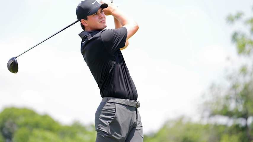 Davis Thompson of the United States plays his shot from the 14th tee during the first round of the Charles Schwab Challenge 2025 at Colonial Country Club on May 22, 2025 in Fort Worth, Texas. (Raj Mehta/Getty Images)