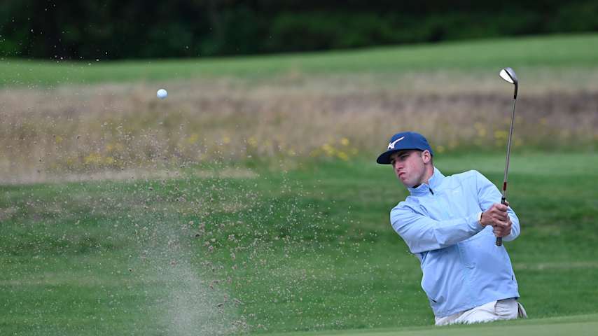 Oj Farrell of Great Britain plays his shot during Day Three of the Sydbank Esbjerg Challenge at Esbjerg Golfklub on August 19, 2021 in Esbjerg, Denmark. (Oliver Hardt/Getty Images)