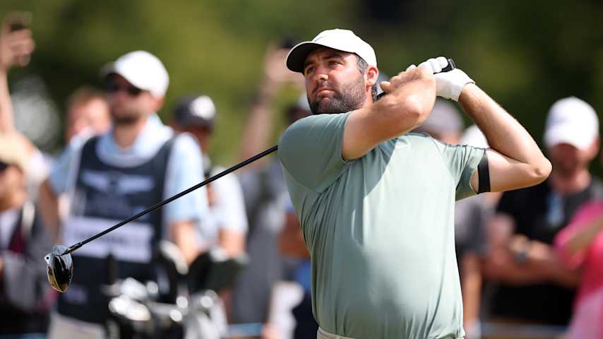 Scottie Scheffler of the United States tees off on the second hole on day four of the Genesis Scottish Open 2025 at The Renaissance Club on July 13, 2025 in North Berwick, Scotland. (Christian Petersen/Getty Images)