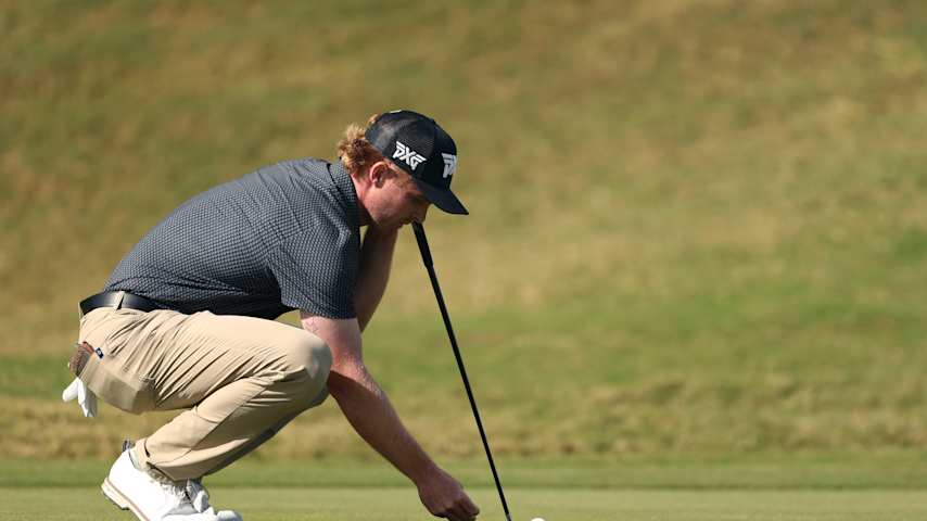 Mason Andersen of the United States lines up a putt on the 18th green during the third round of the Butterfield Bermuda Championship 2025 at Port Royal Golf Course on November 15, 2025 in Southampton, Bermuda. (Kenneth Richmond/Getty Images)