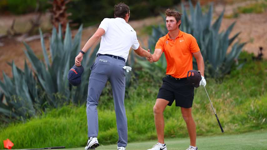 Preston Stout of Oklahoma State University and Ben James of the University of Virginia shakes hands at the end of their match during the final round of match play at Omni La Costa Resort & Spa on May 28, 2025 in Carlsbad, California. (Joe Scarnici/Getty Images)