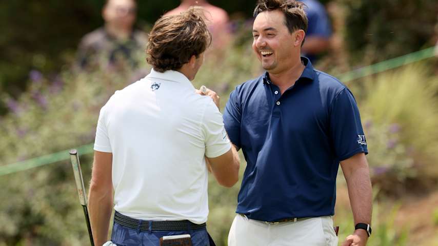 Hank Lebioda shakes hands with playing partner James Nicholas on the 18th hole after the final round of the UNC Health Championship presented by STITCH 2025 at Raleigh Country Club on June 01, 2025 in Raleigh, North Carolina. (Grant Halverson/Getty Images)
