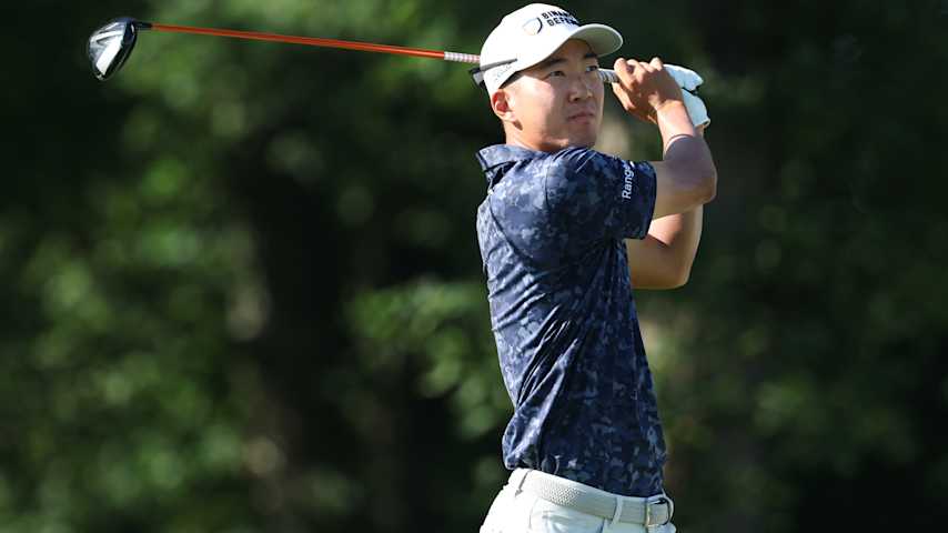 Michael Kim of the United States plays his shot from the 13th tee during the first round of the John Deere Classic 2025 at TPC Deere Run on July 03, 2025 in Silvis, Illinois. (David Berding/Getty Images)