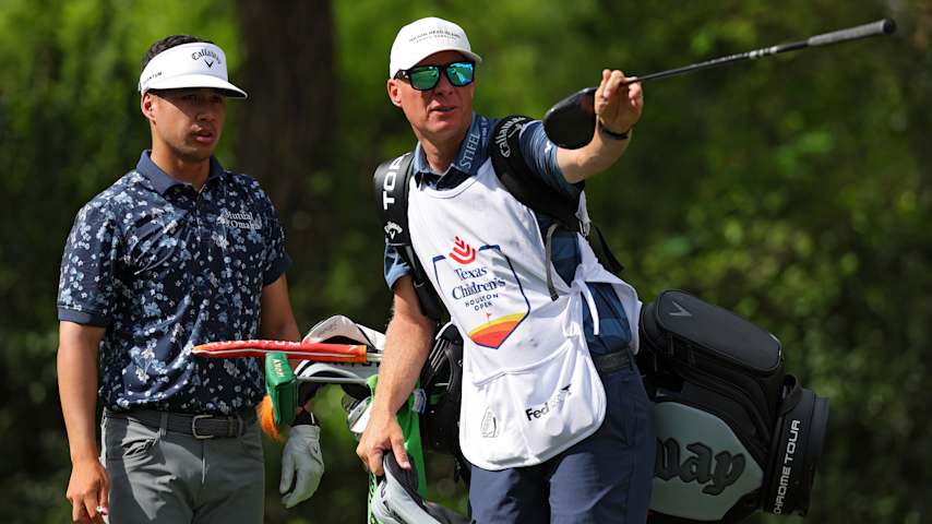 Isaiah Salinda of the United States and his caddie discuss a shot from the eighth tee during the first round of the Texas Children's Houston Open 2026 at Memorial Park Golf Course on March 26, 2026 in Houston, Texas. (Jordan Bank/Getty Images)