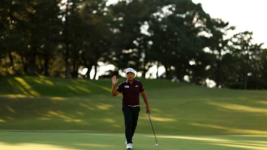 Kevin Yu of Chinese Taipei acknowledges the gallery after holing out on the 9th green during the first round of the Baycurrent Classic 2026 at Yokohama Country Club on October 8, 2026 in Yokohama, Kanagawa, Japan. (Yong Teck Lim/Getty Images)