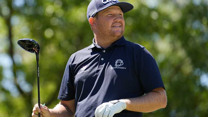 Zac Blair of the United States watches his shot from the 18th tee during the second round of the Colonial Life Charity Classic 2026 at The Woodcreek Club on May 15, 2026 in Elgin, South Carolina. (Raj Mehta/Getty Images)