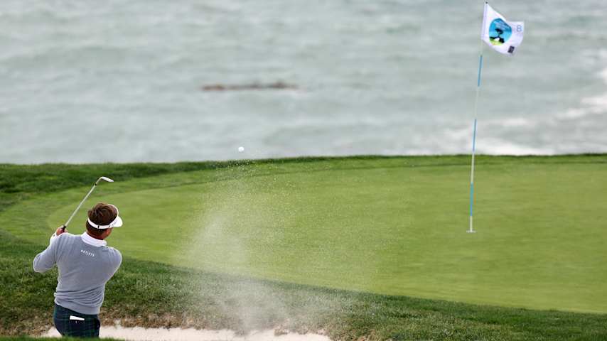 Keith Mitchell of the United States plays a shot from a bunker on the eighth hole during the third round of the AT&T Pebble Beach Pro-Am 2026 at Pebble Beach Golf Links on February 14, 2026 in Pebble Beach, California. (Mike Mulholland/Getty Images)