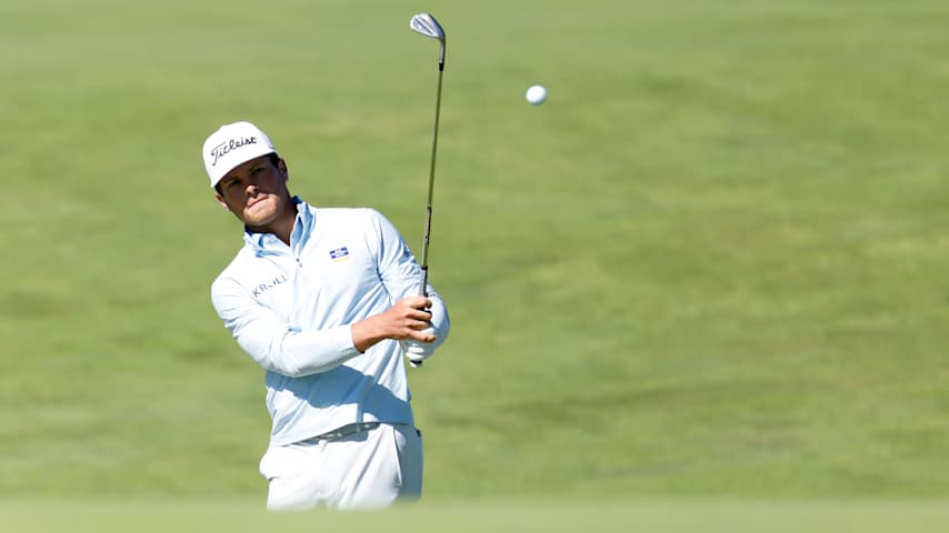 Michael Brennan of the United States plays a shot on the fifth hole during a practice round prior to the 126th U.S. OPEN at Shinnecock Hills Golf Club on June 16, 2026 in Southampton, New York. (Cliff Hawkins/Getty Images)