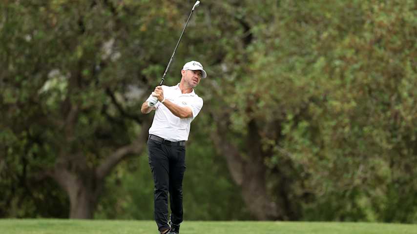 Brian Harman of the United States plays a shot on the 18th hole during the second round of the Valero Texas Open 2026 at TPC San Antonio on April 03, 2026 in San Antonio, Texas. (Stacy Revere/Getty Images)