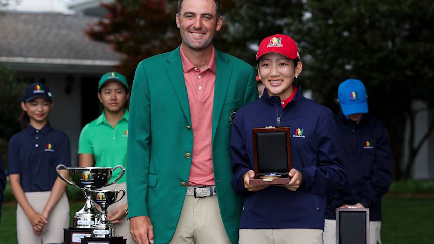 Masters Champion Scottie Scheffler poses with Moa Kim of the Girls 12-13 group during the Drive, Chip and Putt Championship at Augusta National Golf Club on April 05, 2026 in Augusta, Georgia. (Maddie Meyer/Getty Images)