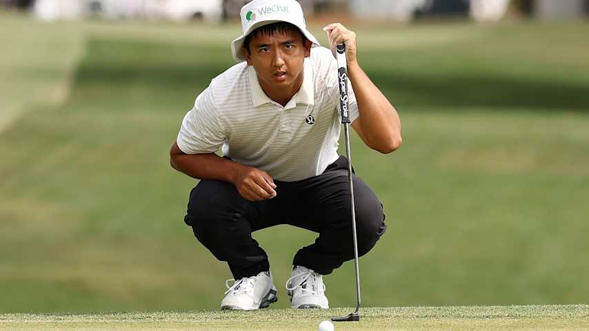 Zecheng Dou of the People's Republic of China lines up a putt on the first green during the third round of the Texas Children's Houston Open 2026 at Memorial Park Golf Course on March 28, 2026 in Houston, Texas. (Mike Mulholland/Getty Images)