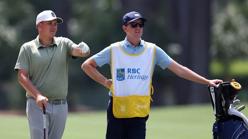 Sami Valimaki of Finland prepares to play a shot on the 15th hole alongside caddie Greg Milne during the first round of the RBC Heritage 2026 at Harbour Town Golf Links on April 16, 2026 in Hilton Head Island, South Carolina. (Kevin C. Cox/Getty Images)