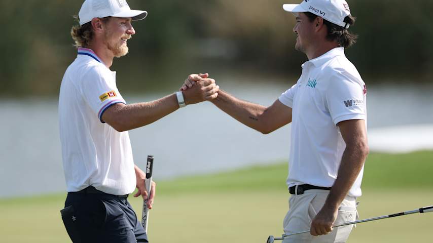 Kristoffer Reitan (L) of Norway and Kris Ventura of Norway react after making an eagle on the 18th hole during the final round of the Zurich Classic of New Orleans 2026 at TPC Louisiana on April 26, 2026 in Avondale, Louisiana. (Chris Graythen/Getty Images)