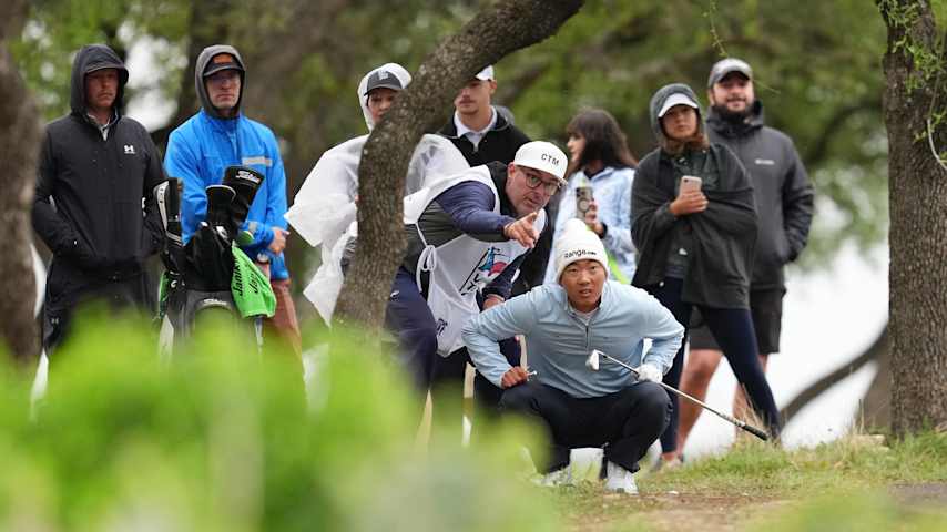 Michael Kim of the United States prepares to hit his approach shot on the 18th hole during the continuation of the third round of the Valero Texas Open 2026 at TPC San Antonio on April 05, 2026 in San Antonio, Texas. (Dylan Buell/Getty Images)