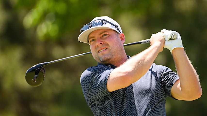 Austin Hurt of the United States, PGA of America Club Professional, plays his shot from the seventh tee during a practice round prior to the start of the 2022 PGA Championship at Southern Hills Country Club on May 16, 2022 in Tulsa, Oklahoma. (Ross Kinnaird/Getty Images)