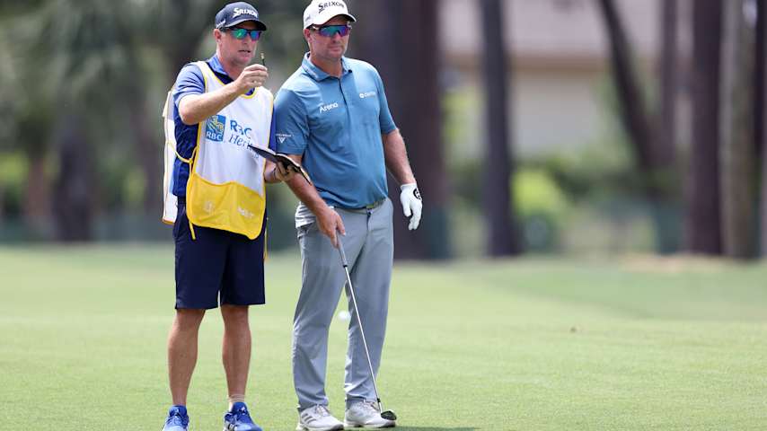 Ryan Fox of New Zealand prepares to play a shot on the 15th hole alongside caddie Dean Smith during the first round of the RBC Heritage 2026 at Harbour Town Golf Links on April 16, 2026 in Hilton Head Island, South Carolina. (Kevin C. Cox/Getty Images)