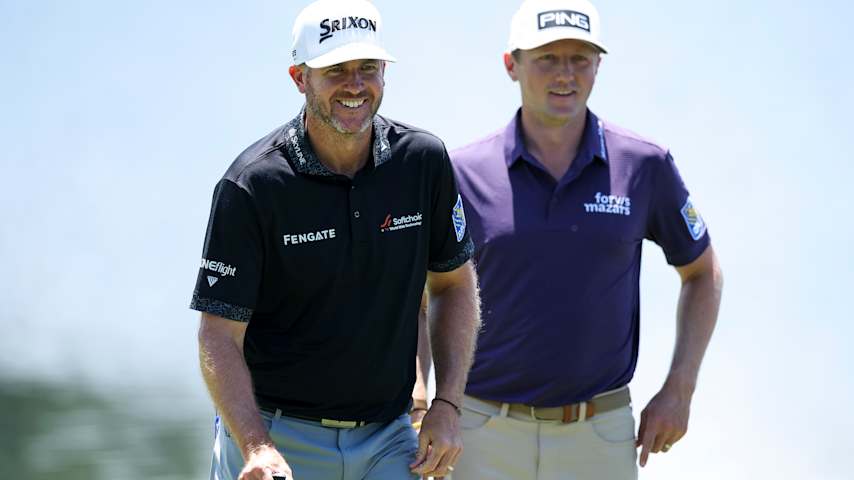 Taylor Pendrith of Canada and Mackenzie Hughes of Canada look on while playing the 14th hole during the second round of the Truist Championship 2026 at Quail Hollow Country Club on May 08, 2026 in Charlotte, North Carolina. (Andrew Redington/Getty Images)