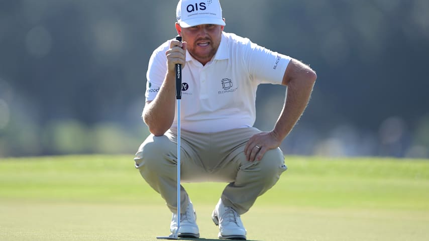 Zac Blair of the United States lines up a putt on the first green during the final round of The RSM Classic 2025 at Sea Island Resort on November 23, 2025 in St Simons Island, Georgia. (Jonathan Bachman/Getty Images)