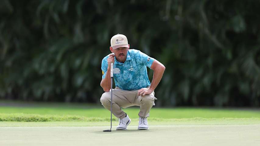 Chandler Phillips of the United States lines up a putt on the first green during the final round of the Sony Open in Hawaii 2026 at Waialae Country Club on January 18, 2026 in Honolulu, Hawaii. (Mike Mulholland/Getty Images)